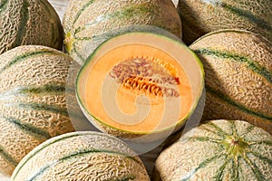 Whole and sliced Ã¢â¬â¹Ã¢â¬â¹melon, honeydew melon or melon cantaloupe close up photo